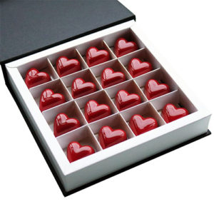 Red Heart Chocolates in Open Chocolate Gift Box Angled