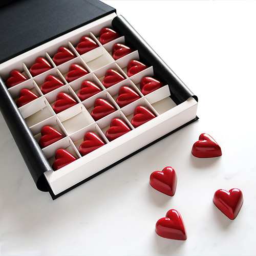 Red Heart Chocolates and Chocolate Gift Box Open Angled