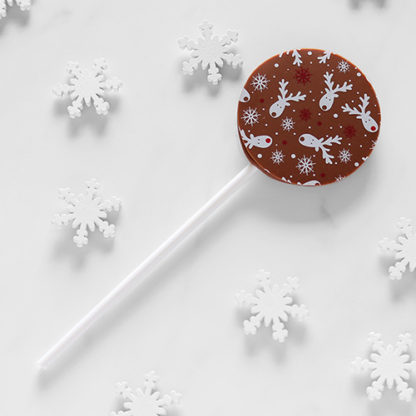 Milk Chocolate Christmas Lollipop with Snowflakes Overhead