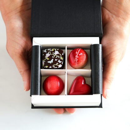 Valentines Chocolates Overhead Hands