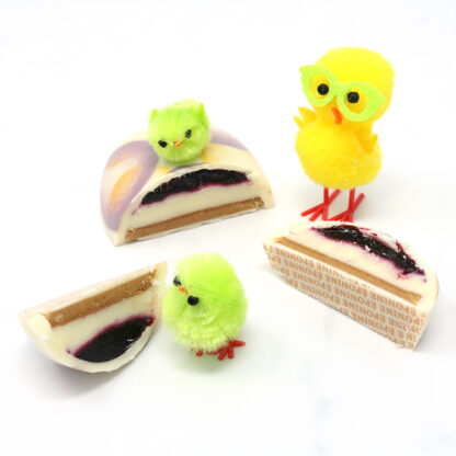 Blueberry Lemon Cheesecake Sn’egg Easter Egg Cut Open Pieces with Chicks